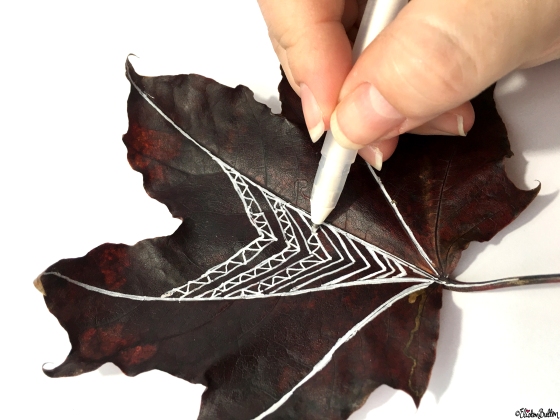 Drawing on Autumn Leaves with White Ink - Workspace Wednesday – Autumn Leaf Art at www.elistonbutton.com - Eliston Button - That Crafty Kid